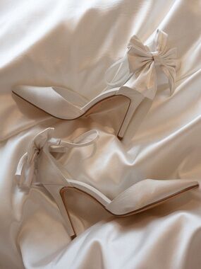 Meshki Charmed Satin Bow Heel in White
